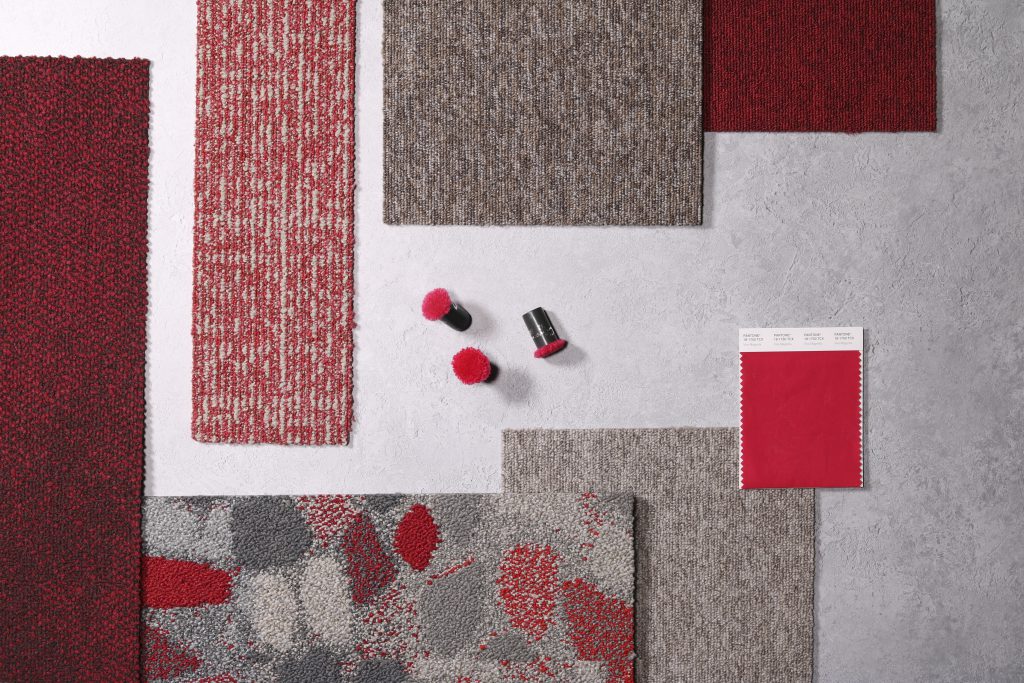 Pantone Colour of the Year 2023 Viva Magenta paired with Interface carpet tiles and LVT